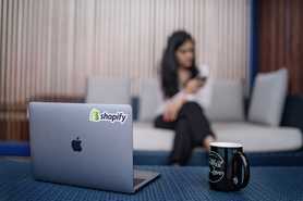 laptop-with-shopify-sticker 3